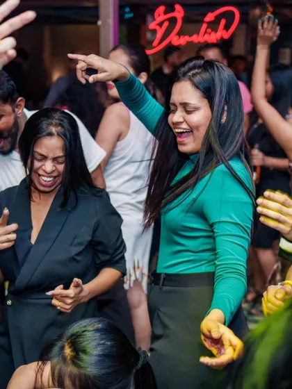 Friends having a great time on the dance floor.