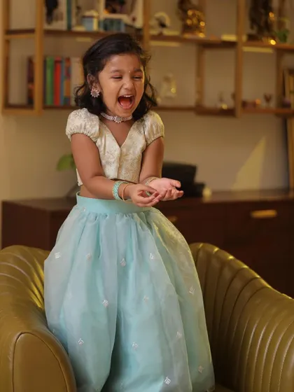 Another shot of pure happiness. This custom lehenga for kids is designed to be comfortable enough for them to play and be themselves.
