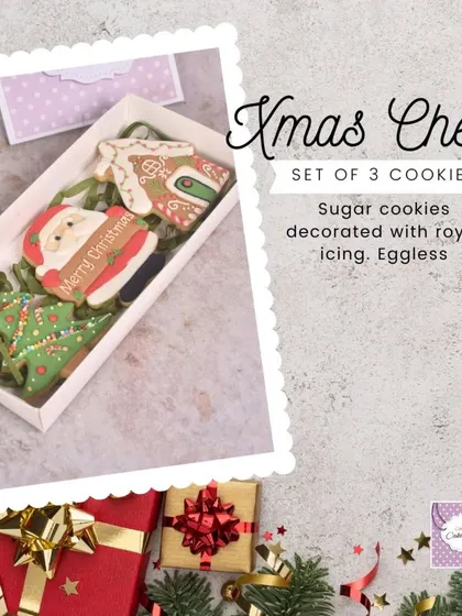 Our 'Xmas Cheer' set includes three decorated sugar cookies: a gingerbread house, a Christmas tree, and a Santa. A perfect little gift box.