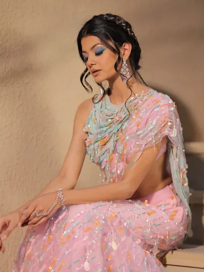 A serene moment captured during the shoot. The makeup is soft, colourful, and artistic.