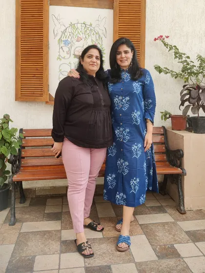 With my dear college friend, Nehu. This indigo dress is easy to wear and stylish, making it a great choice for a long day of catching up with a friend.