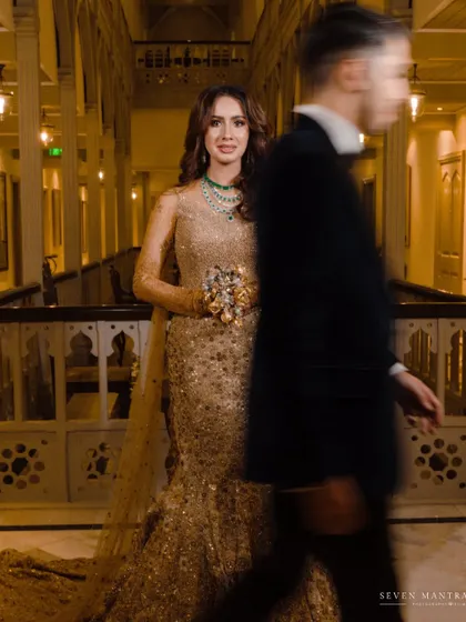 A creative use of motion blur to add a sense of dynamism and story to the portrait. The bride remains the calm, focused center.