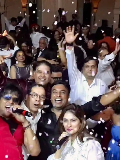 A snapshot of the wild New Year's Eve party in Hong Kong. The confetti is flying, and everyone is on the dance floor.