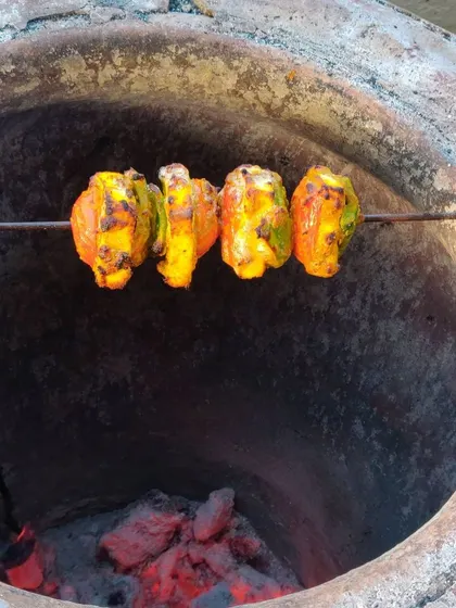 Freshly grilled paneer tikka coming straight out of a traditional tandoor oven. This live station brings authentic, smoky flavours to your event.