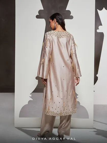 The back view of the Dara Kurti Set, showcasing the clean lines and the continuation of the hand embellishments along the hem.