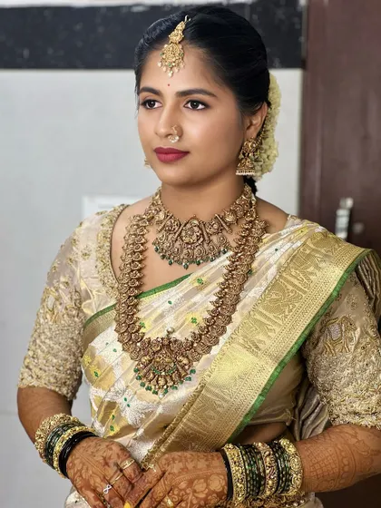 This look is all about creating a flawless canvas. The skin is smooth and even, the eyes are softly defined, and the lip color is a perfect neutral, showcasing a high level of technical skill.