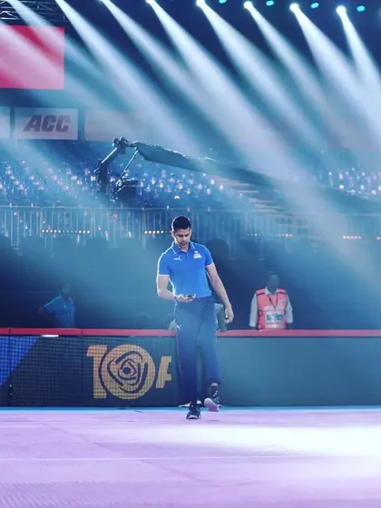 Walking on the mat under the bright lights. A moment to take it all in and count the blessings.