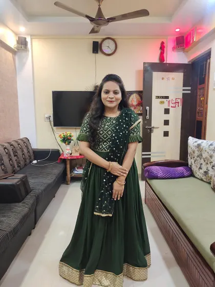 Here is the same green lehenga, showing how beautifully it fits. I work closely with my clients to make sure every outfit is tailored perfectly for them.
