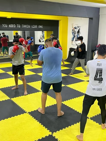 A group of our fighters practicing their stance and guard during a boxing class. Fundamentals are key.