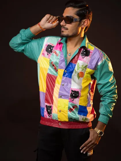 It was super fun styling YouTuber Amit Sharma, "The Indian Unboxer." We created a range of cool, casual looks, including this one with a vibrant patchwork jacket, reflecting his energetic personality.