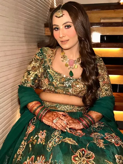 A full-length shot of the vibrant mehandi look, perfect for a pre-wedding party.