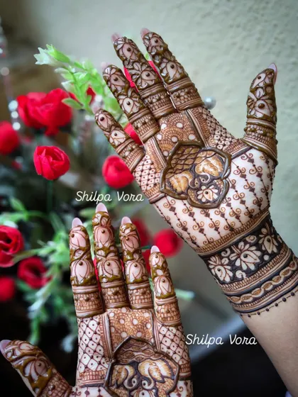 Another view of the elephant motif design, showing the delicate patterns on the fingers.