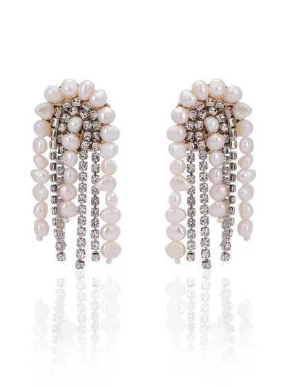 These new danglers combine freshwater pearls and crystal chains for a look that is both classic and modern.
