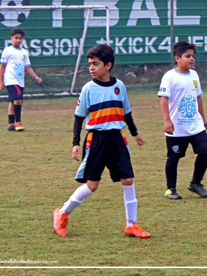 A player focused on the game during a Football Delhi Golden League match. The concentration and determination on his face show what it means to compete.