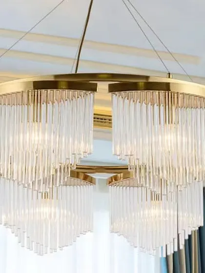 A grand chandelier with curtains of glass rods, creating a luxurious waterfall effect. This is an ideal choice for a formal space with high ceilings.