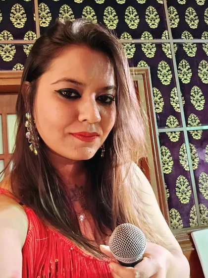 Our female vocalist ready to perform at a corporate event for Axis Bank. Our diverse lineup allows us to cover a wide range of vocal styles.