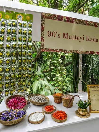 A nostalgic '90s Muttai Kada' (candy shop) at a wedding, filled with classic Indian sweets from the couple's childhood.