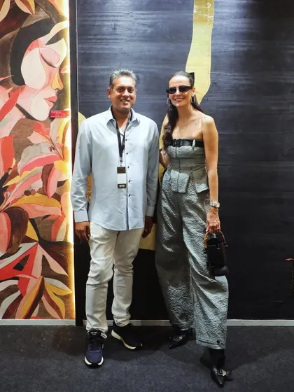 A pleasure to host Mandana Karimi at our booth. She is pictured here against a backdrop of our bold, artistic wall panels, a perfect match for her stylish presence.