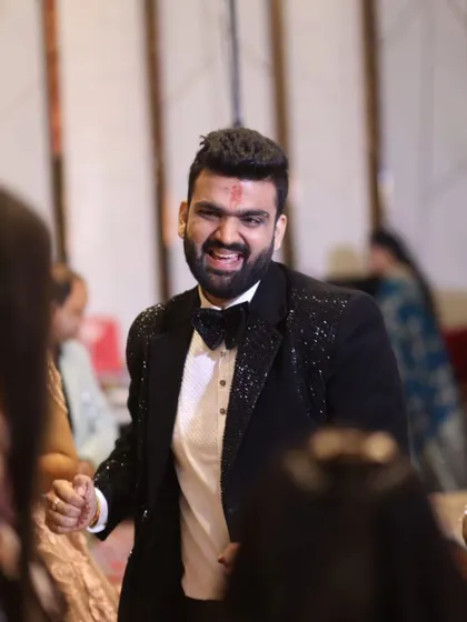 A candid shot of the groom enjoying himself on the dance floor. This photo captures the energy and happiness of the celebration, showing that I focus on the groom's experience as much as the bride's.