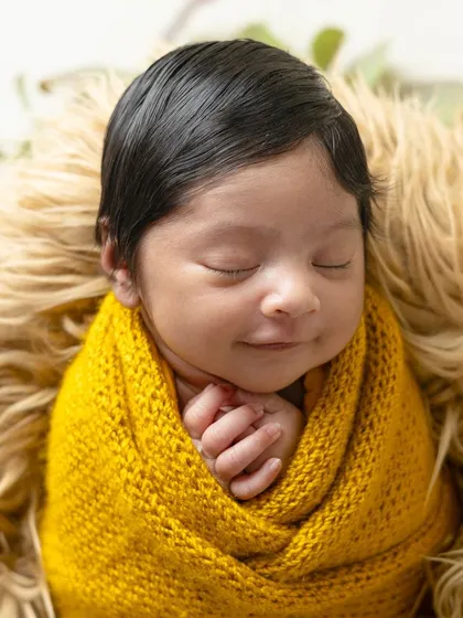 There is nothing more precious than a newborn's smile. My newborn sessions are designed to be calm and gentle, capturing those fleeting, peaceful moments while your baby dreams.
