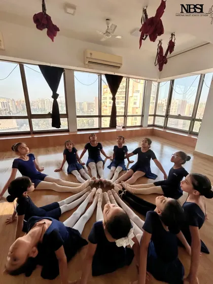 The cutest circle of ballerinas. This is a common sight in our studio, a moment of connection and friendship.
