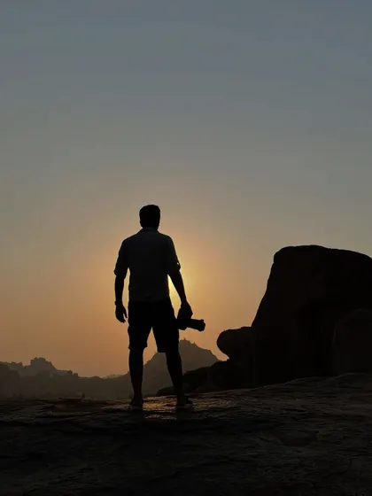 Watching the sunset after a long day of photography. The quiet moments in nature are just as important as the dramatic sightings.