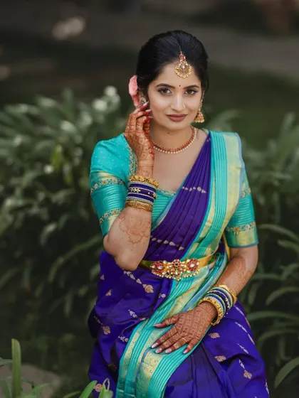 Another angle of Ramya's look, showing how the makeup enhances her features and complements the intricate details of her saree and jewelry.