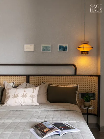 A soft palette, woven textures, and just the right glow. This bedroom was designed to feel calm and grounded, from the rattan headboard to the sculptural pendant light. Every detail plays a quiet note in a restful symphony.