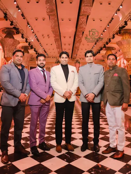 A group of advocates looking sharp at a wedding reception. We capture great portraits of your guests and friends celebrating with you.