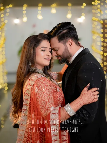 A romantic embrace at the reception, with a quote from a love song perfectly capturing the mood of the moment.