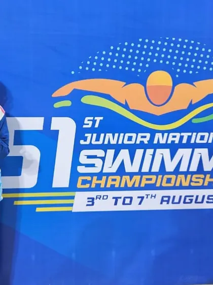 Advaitha striking gold in the 50m Backstroke at the Junior Nationals.