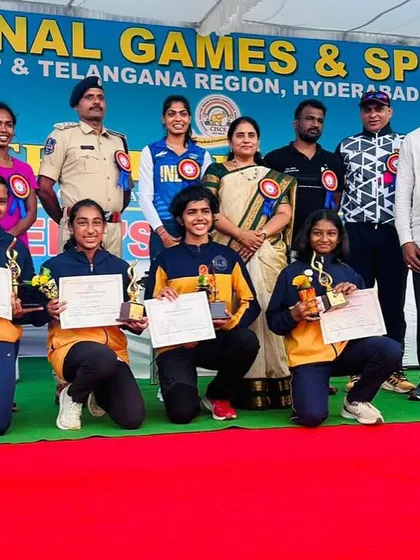 The victorious girls' 4x400 relay team takes the stage after winning gold at the CISCE National Games in Hyderabad.