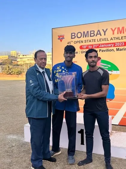 My athlete Harshal Gaikwad receiving his Individual Championship trophy at the 45th YMCA Open State Level Athletic Championship.