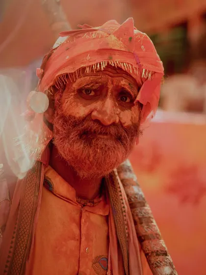 A comprehensive photo series from Lathmaar Holi in Barsana. These images document the unique tradition where women playfully hit men with sticks, recreating a legend of Lord Krishna and Radha. The photos are filled with motion, color, and raw emotion.
