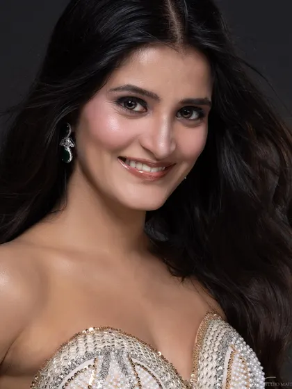 A bright, smiling portrait of a pageant contestant, perfect for showing personality.