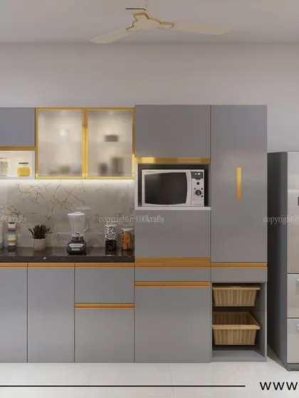 This view of the 'Konark Oasis' kitchen shows the smart integration of appliances, including the microwave and refrigerator, as well as open wicker baskets for vegetable storage.