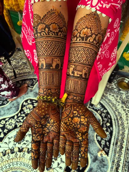 For my traditional Hindu brides, I create designs rich in cultural symbolism. This piece features classic elephant motifs and intricate patterns, perfect for traditional wedding ceremonies.