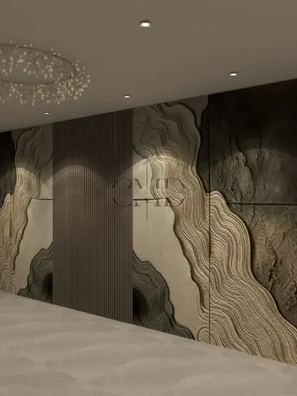 This passageway in a Noida penthouse features a stunning wall with handcrafted, textured 3D and fluted panels, creating incredible depth and artistry.