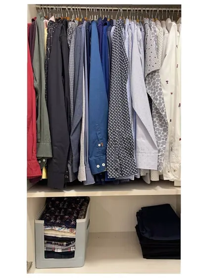 This is a section of a men's wardrobe I organized for a client through a virtual session. We hung all the formal and casual shirts, creating a clean and accessible space.
