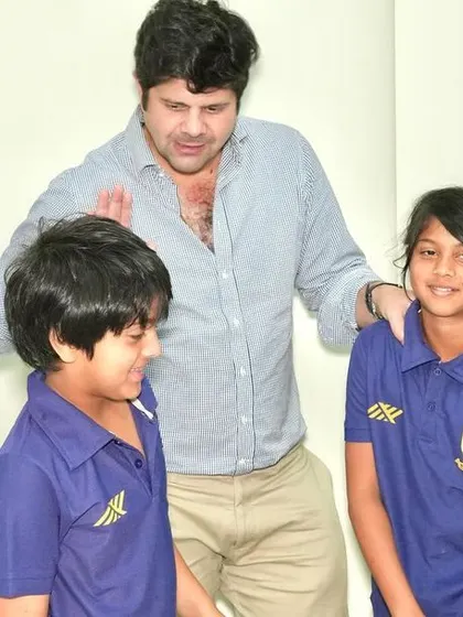 Candid moments of joy and interaction between parents and players.