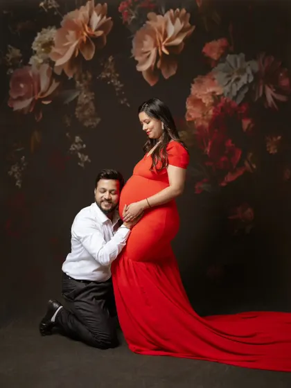Listening to the sweetest heartbeat, creating the most precious memories. This classic portrait shows a dad-to-be connecting with his unborn child in a moment of pure love.