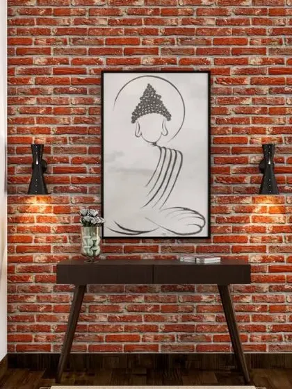This foyer design creates a peaceful and serene welcome with a brick accent wall and a beautiful line-art Buddha frame.