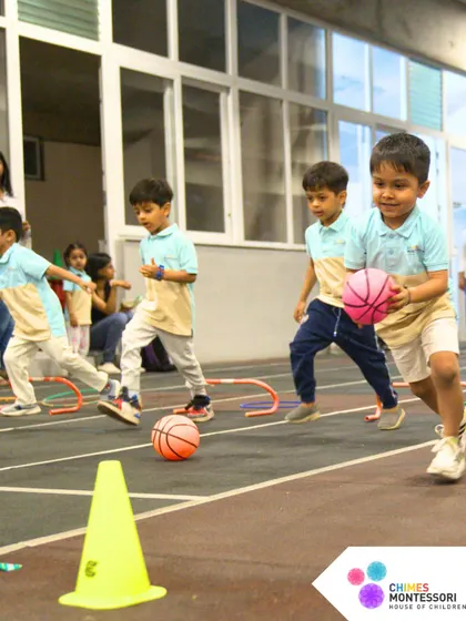 Little athletes participate in a dribbling race, showing their developing motor skills and competitive spirit.