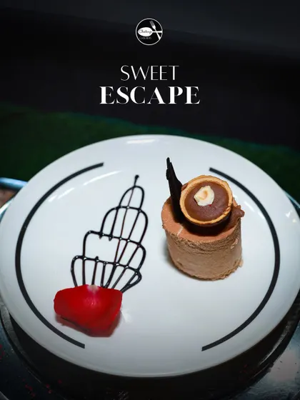A sweet escape for chocolate lovers. This plated dessert is my take on a Ferrero Rocher, with layers of rich chocolate ganache, crunchy hazelnut praline, and a delicate chocolate garnish.