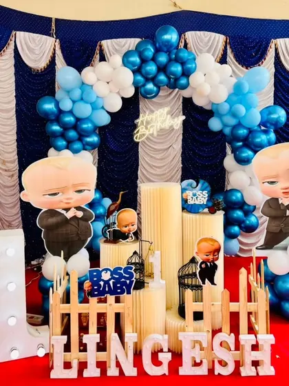 We can create a full Boss Baby experience, as seen in this setup for Ritvik's birthday. The stage is filled with characters, themed props, and coordinated balloons for a party that's all business.