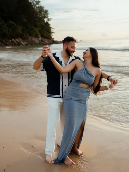 A spontaneous dance on the wet sand in Phuket. We love capturing these moments of pure joy and friendship that make your story uniquely yours.