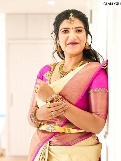 Happy smiles from my lovely client Ramya. It was so much fun getting her ready for this event with a soft, glowing makeup look that complemented her beautiful pink and cream saree.