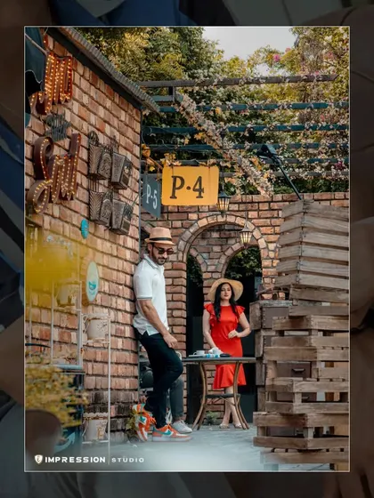 A stylish, café-themed set provides the perfect backdrop for this modern couple. This shot shows how we can use creative locations to craft a specific mood and aesthetic for your pre-wedding photos.
