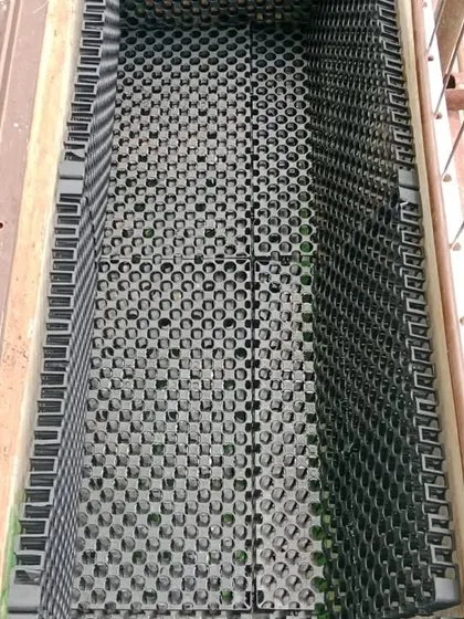 Proper drainage is key to a healthy terrace garden. Before adding soil, I install these drain cell mats, which create a void for excess water to flow away, preventing waterlogging and protecting your roof.