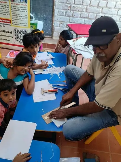 Our mentor Ashok Urs leads a bookbinding workshop for children. It's amazing to see their focus and creativity as they learn to bind their own books.
